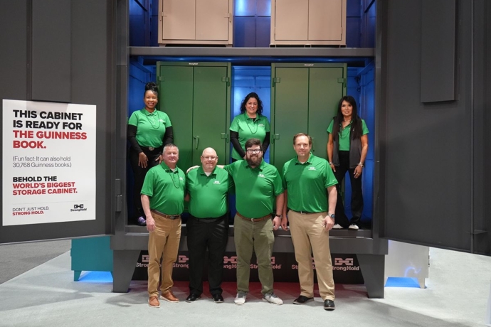 Strong Hold team in the world's largest storage cabinet