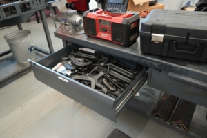 WPCC Welding Classroom with ustom 7-gauge steel shop tables with predrilled holes for mounting vises