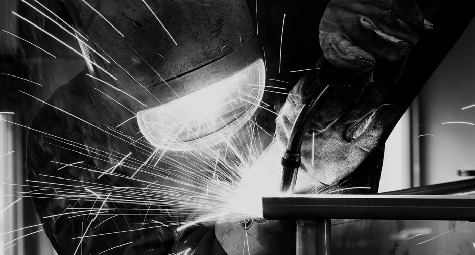 Welder working in the Strong Hold production facility